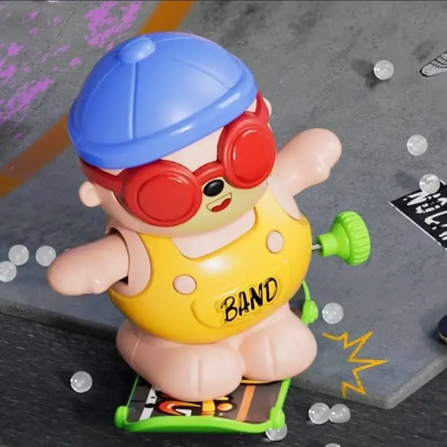 NN9gG9Ui.webp Skateboard Bear Wind Up Toy - Image 1